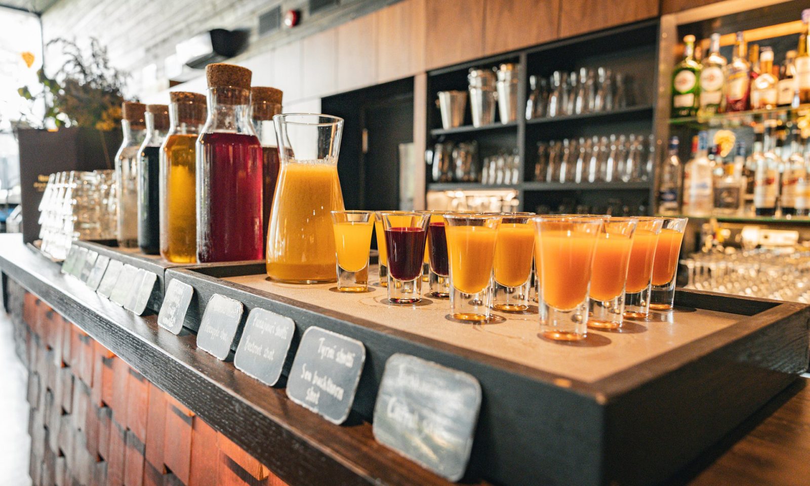 Breakfast includes wide variety of different drinks and berry and vegetable shots.